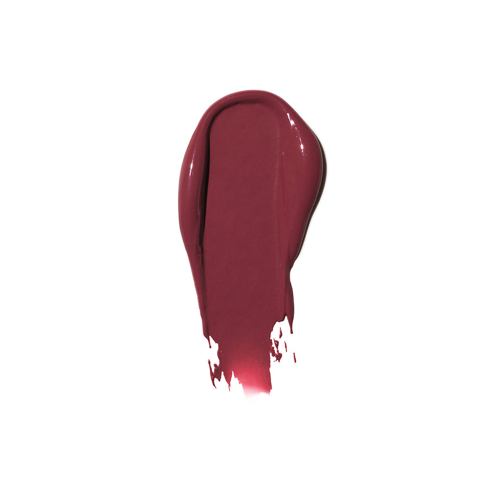 A swatch of Jones Road Beauty's The Lip Tint in the shade Nude Rose